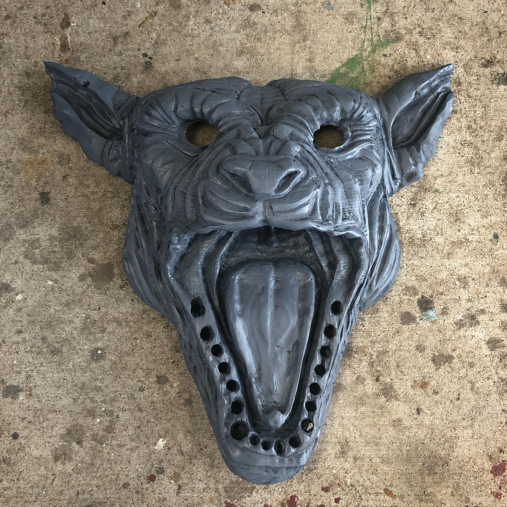 Devil-dog carving by Nevermore Creations, with digitally edited eye openings, inside the Kutzall Creatures I Entered frame